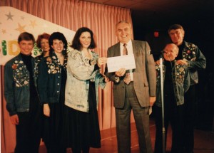 1990 Win a date with John Roell to benefit Children's Hospital